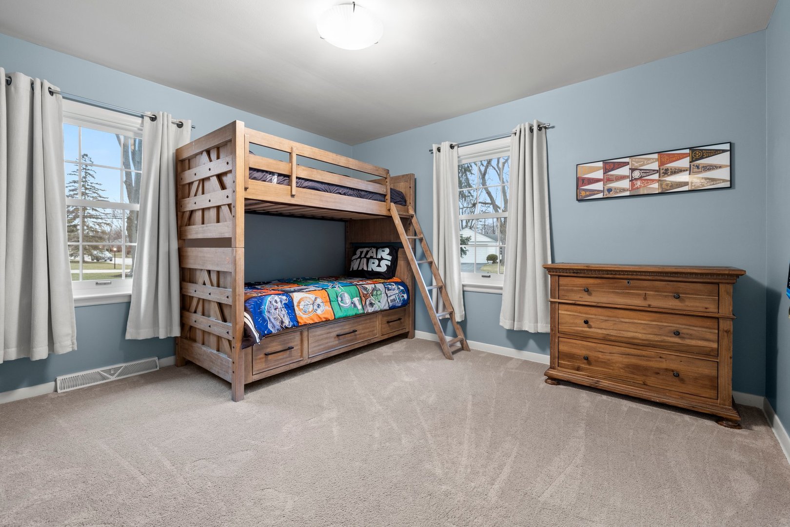 2441 Pick Drive Glenview, IL 60025 - Photo 27 of 43 a living room with furniture and a flat screen tv