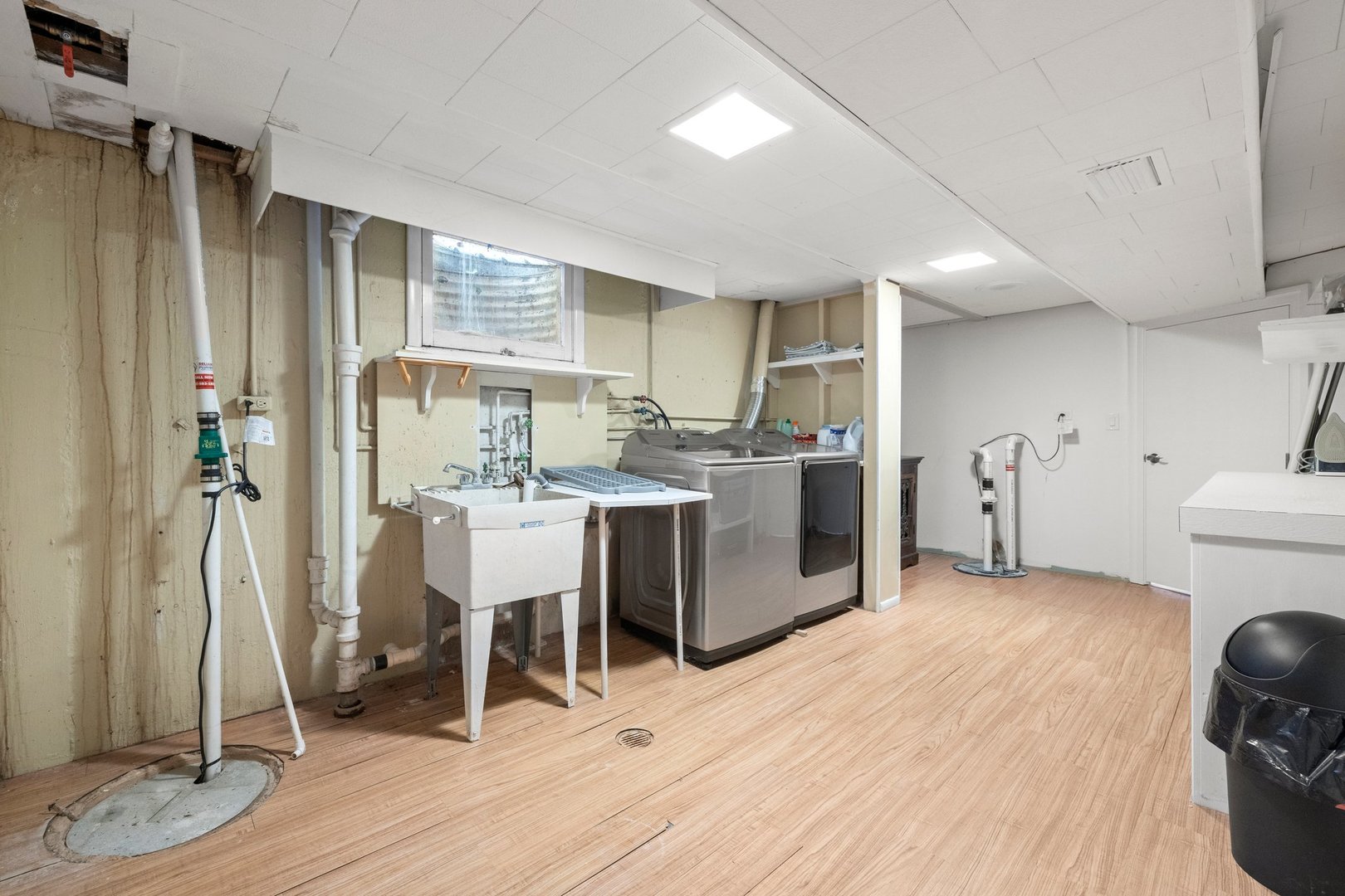2441 Pick Drive Glenview, IL 60025 - Photo 37 of 43 a kitchen with kitchen island a counter top space a sink stainless steel appliances and cabinets
