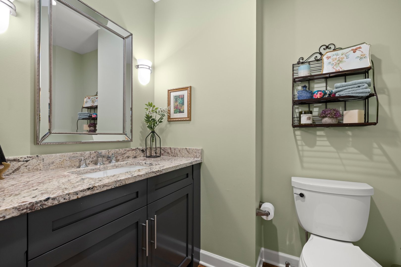 2441 Pick Drive Glenview, IL 60025 - Photo 39 of 43 a bathroom with a toilet sink and mirror