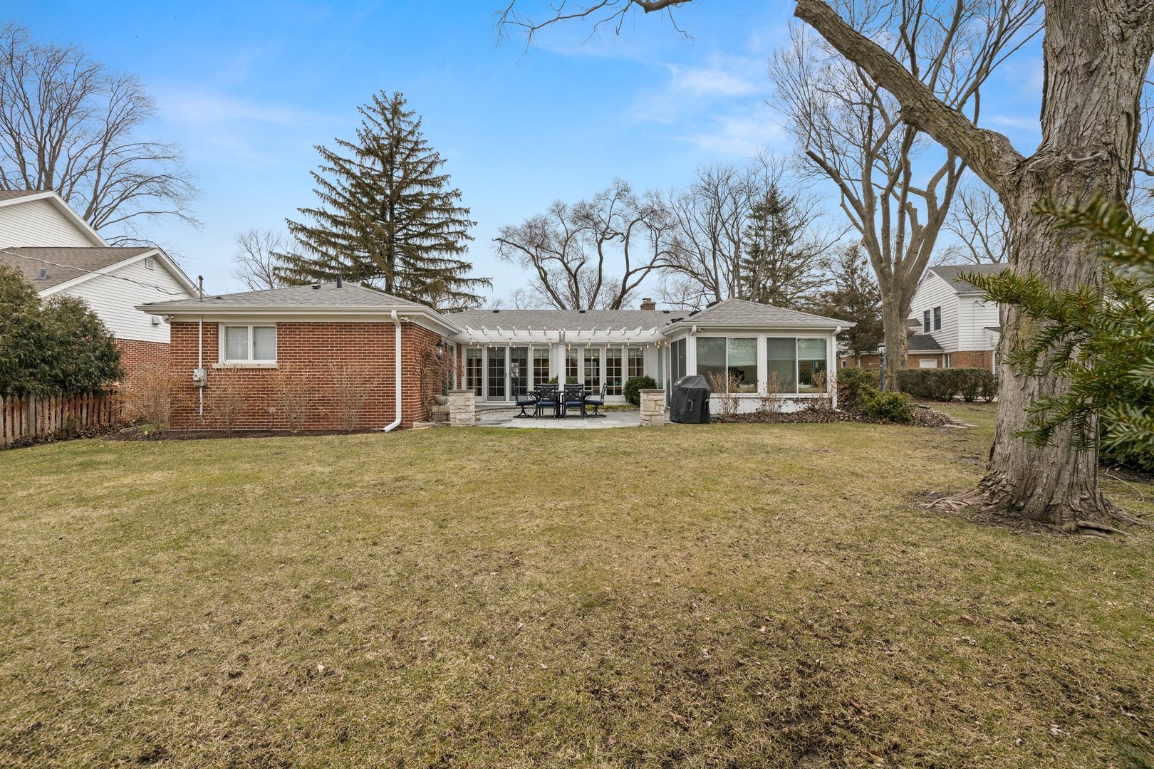 2441 Pick Drive Glenview, IL 60025 - Photo 41 of 43 a front view of a house with a garden