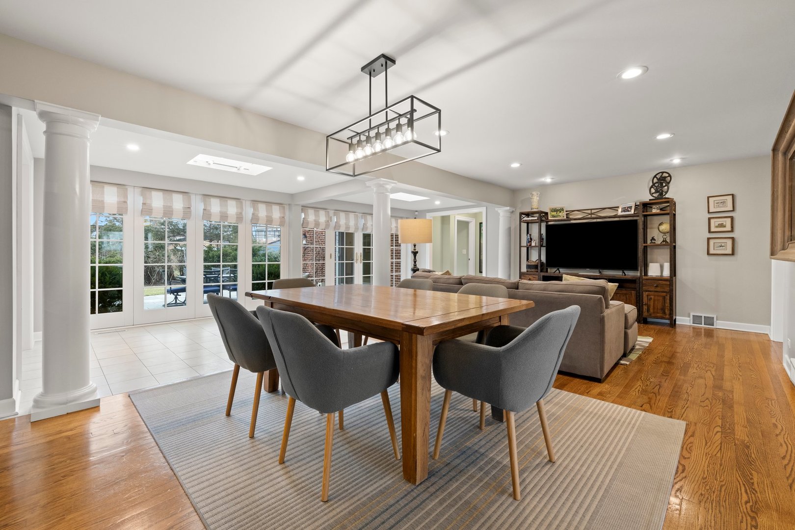2441 Pick Drive Glenview, IL 60025 - Photo 9 of 43 a view of a dining room with furniture window and wooden floor