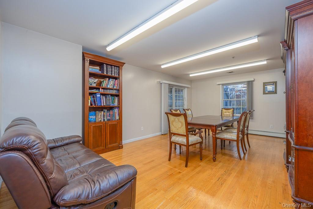 3 Horizon Court, Unit 304 Monsey, NY 10952 - Photo 18 of 36 a living room with furniture and a wooden floor