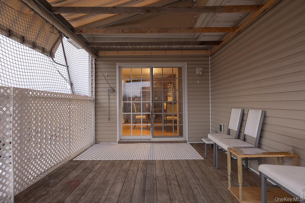 3 Horizon Court, Unit 304 Monsey, NY 10952 - Photo 20 of 36 a view of outdoor space with wooden floor and windows
