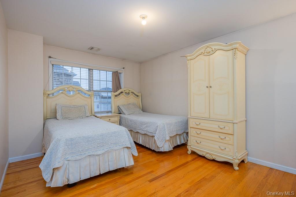 3 Horizon Court, Unit 304 Monsey, NY 10952 - Photo 24 of 36 a bedroom with two beds and painted walls