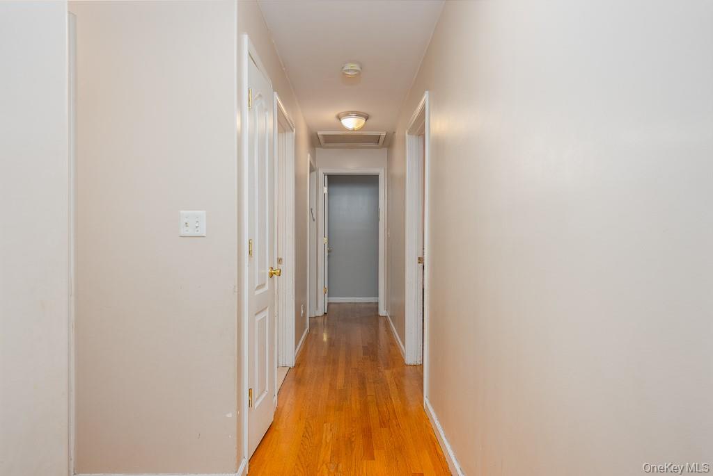 3 Horizon Court, Unit 304 Monsey, NY 10952 - Photo 26 of 36 a view of a hallway with wooden floor