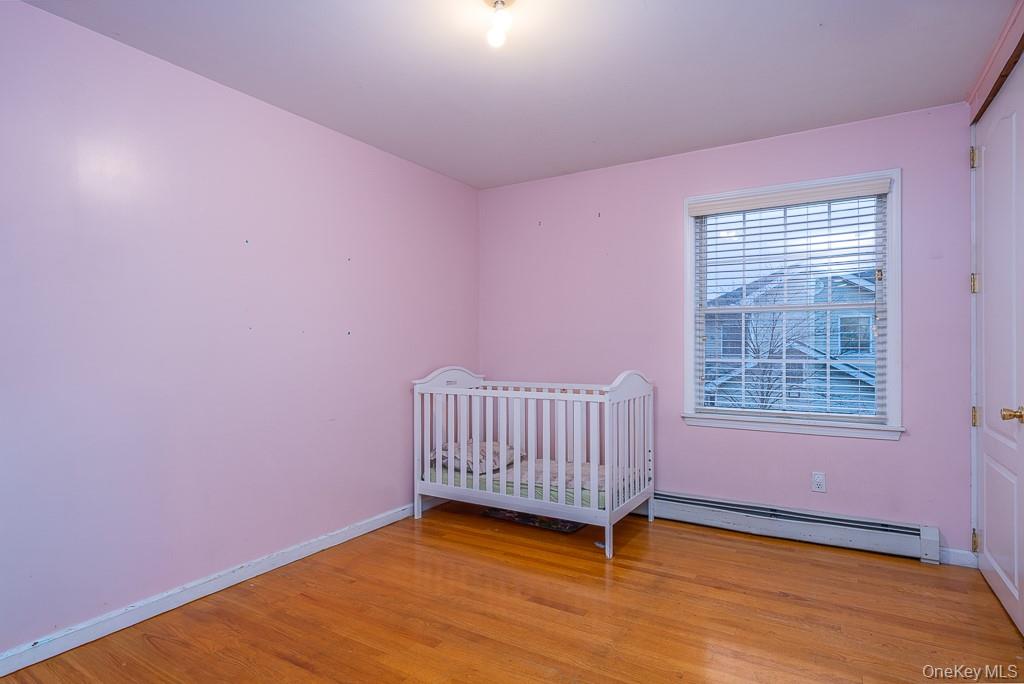 3 Horizon Court, Unit 304 Monsey, NY 10952 - Photo 30 of 36 a view of livingroom with hardwood floor and window