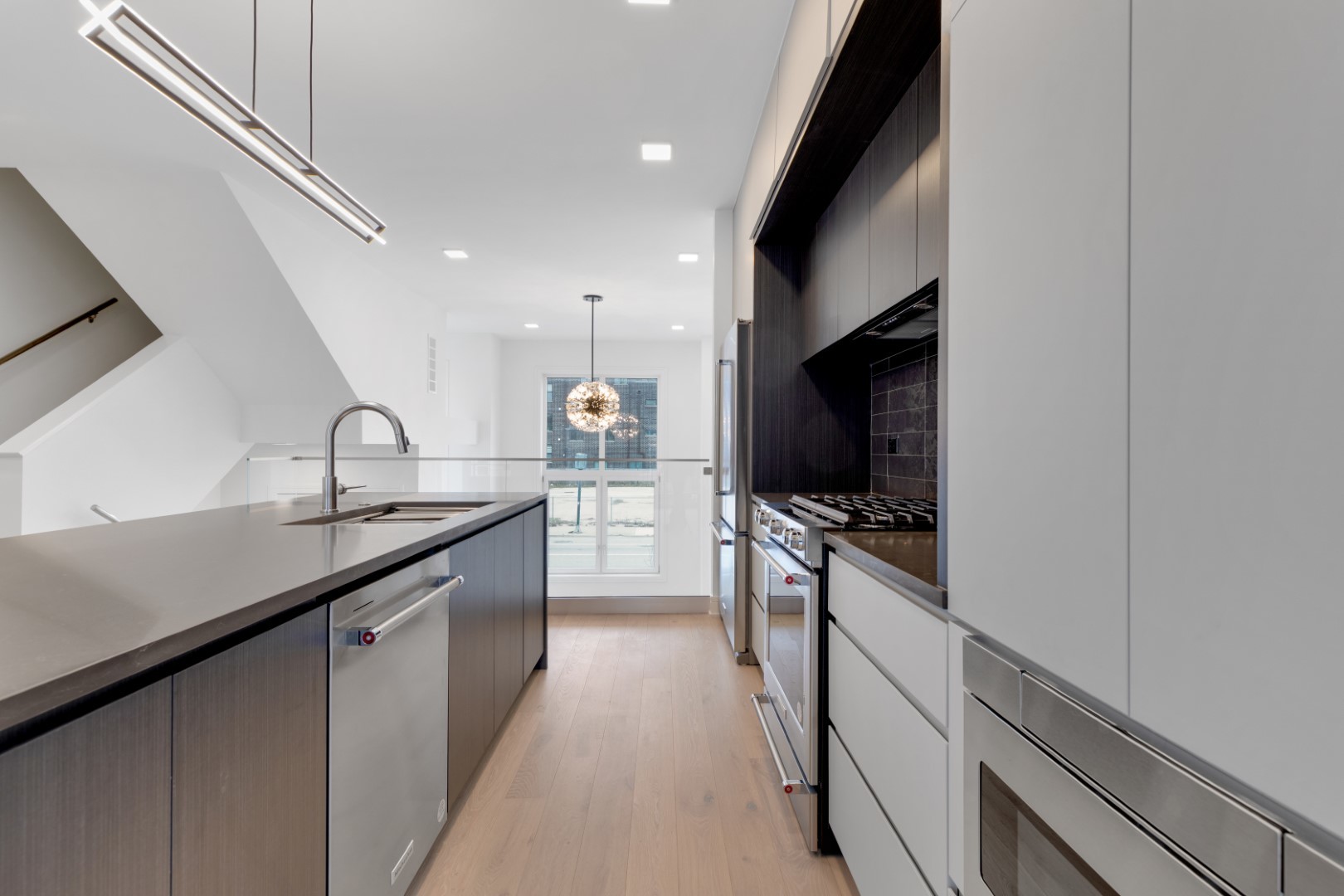336 East Pershing Road Chicago, IL 60653 - Photo 18 of 86 a kitchen with stainless steel appliances granite countertop a sink and a stove