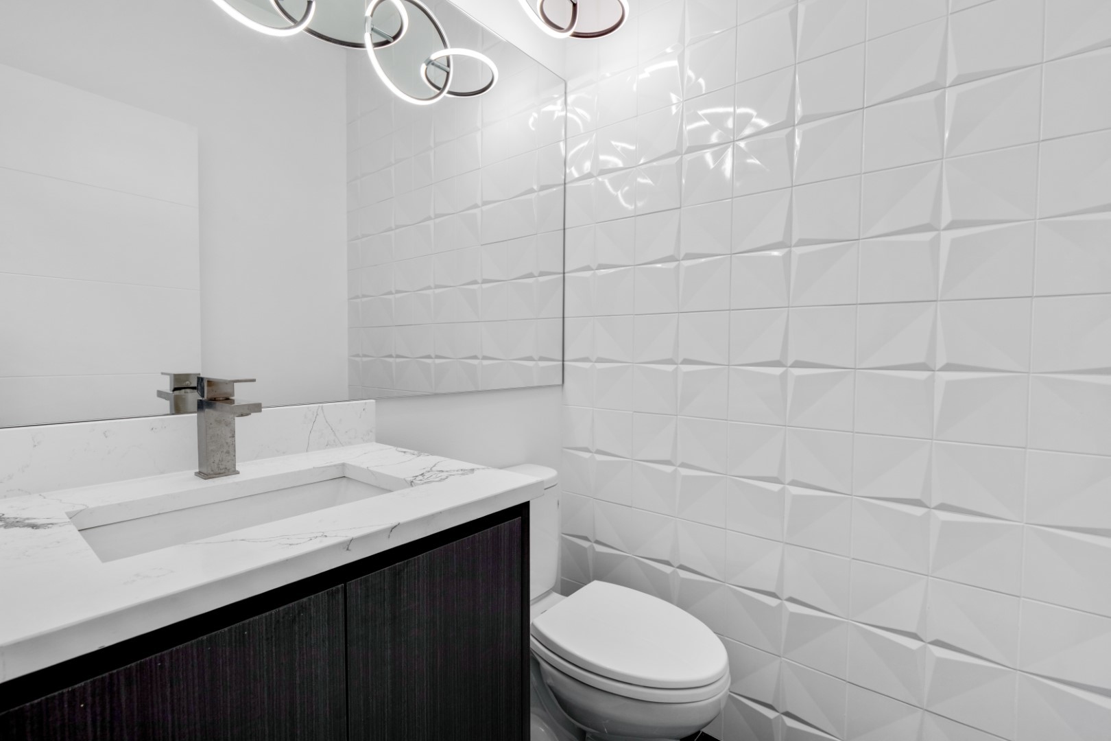 336 East Pershing Road Chicago, IL 60653 - Photo 36 of 86 a bathroom with a sink a toilet and vanity