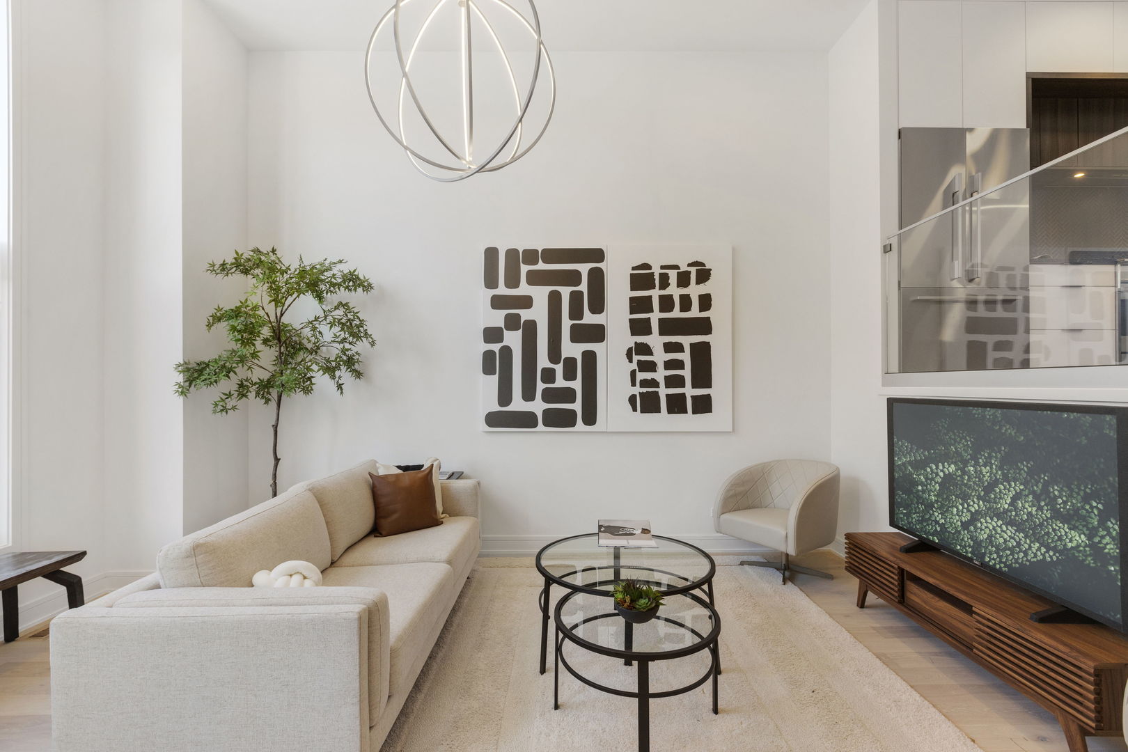 336 East Pershing Road Chicago, IL 60653 - Photo 4 of 86 a living room with furniture a table and a potted plant