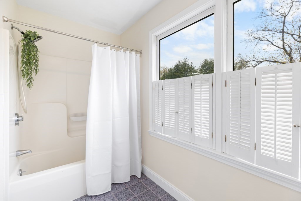 55 Hickory Road Sudbury, MA 01776 - Photo 27 of 42 a view of a bathroom with a large window