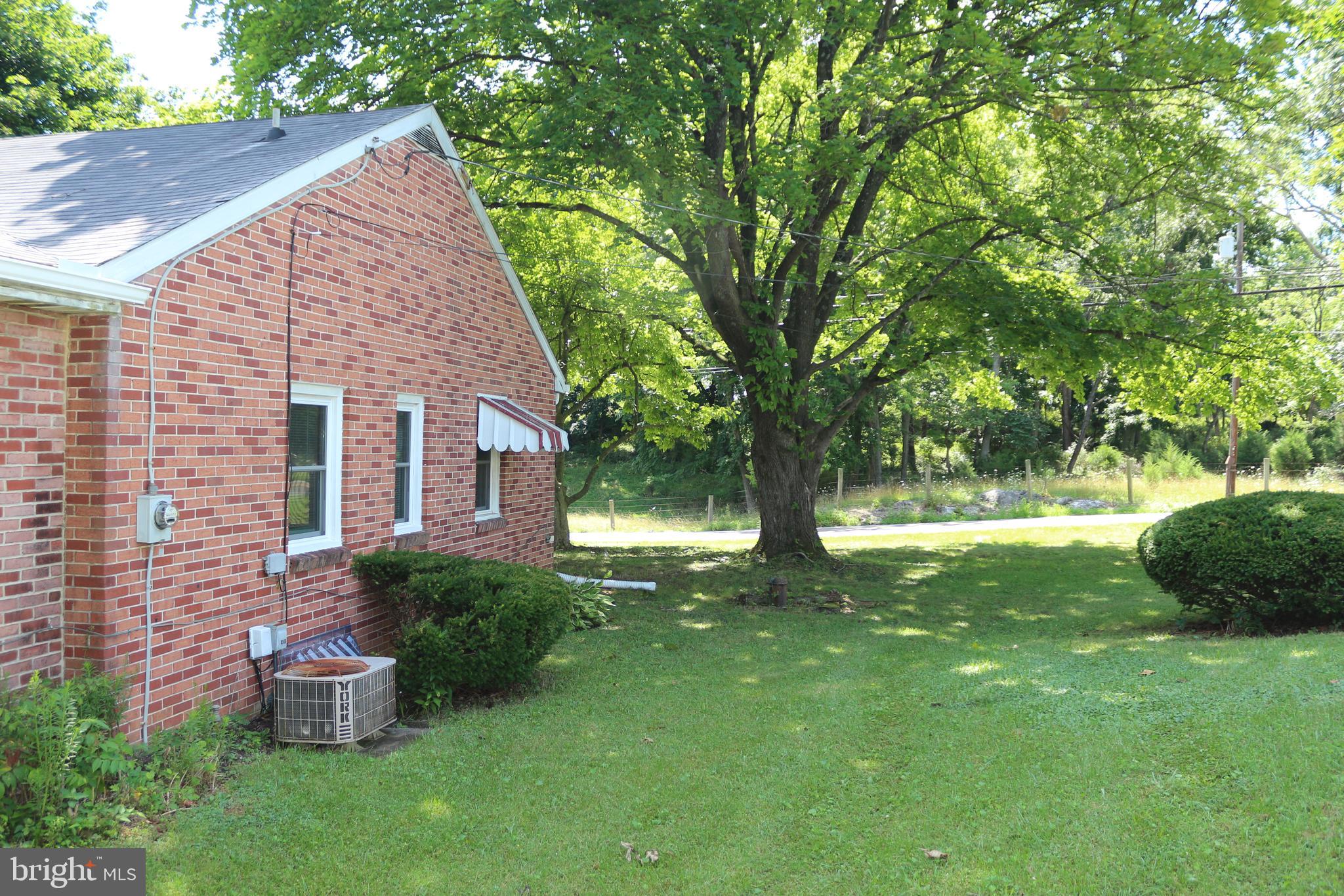 15940 Falling Waters Road Williamsport, MD 21795 - Photo 20 of 21 Left side that you access rear yard by car