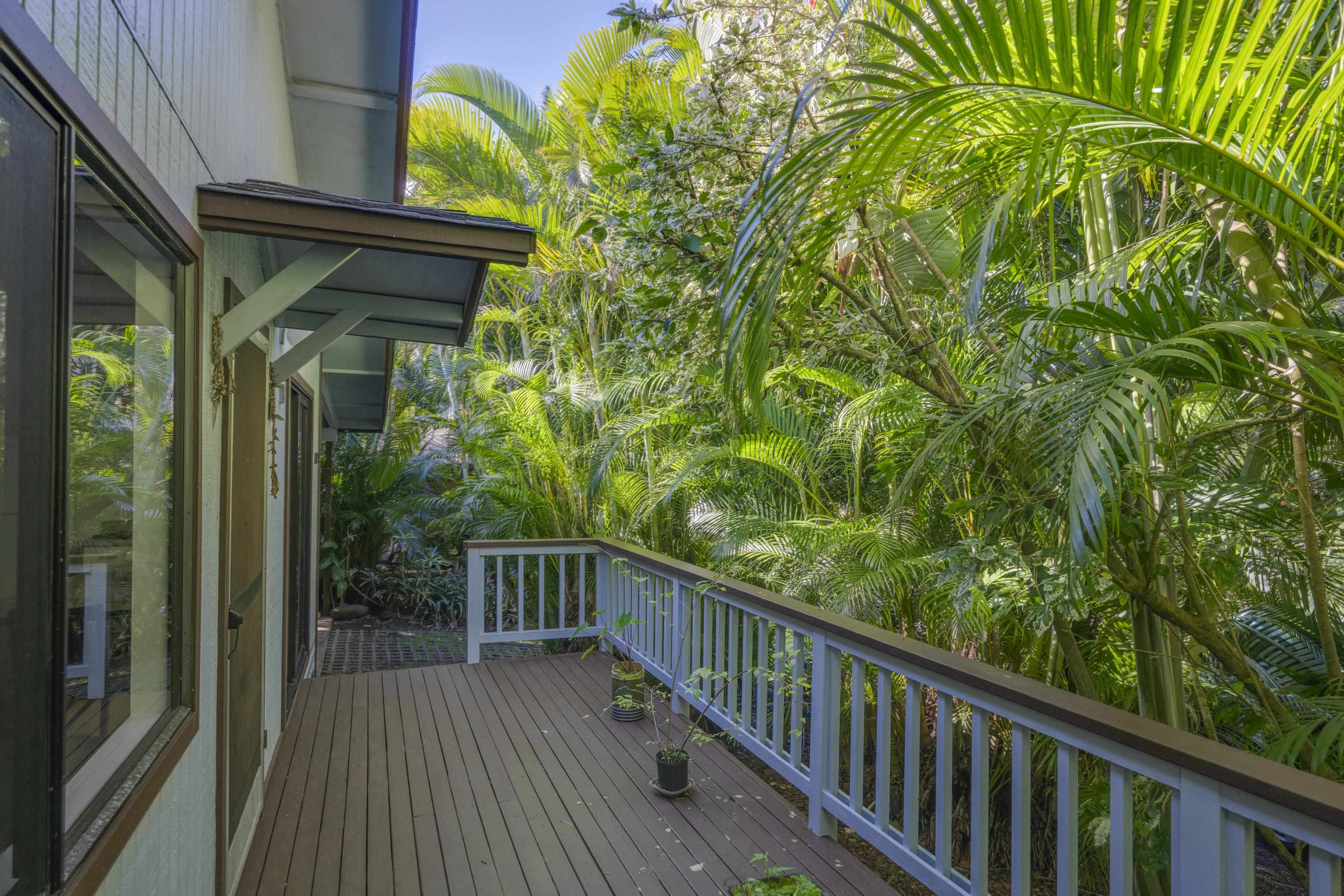 1002 Kauhikoa Road, Unit 2 Haiku, HI 96708 - Photo 1 of 24 a view of balcony with wooden floor