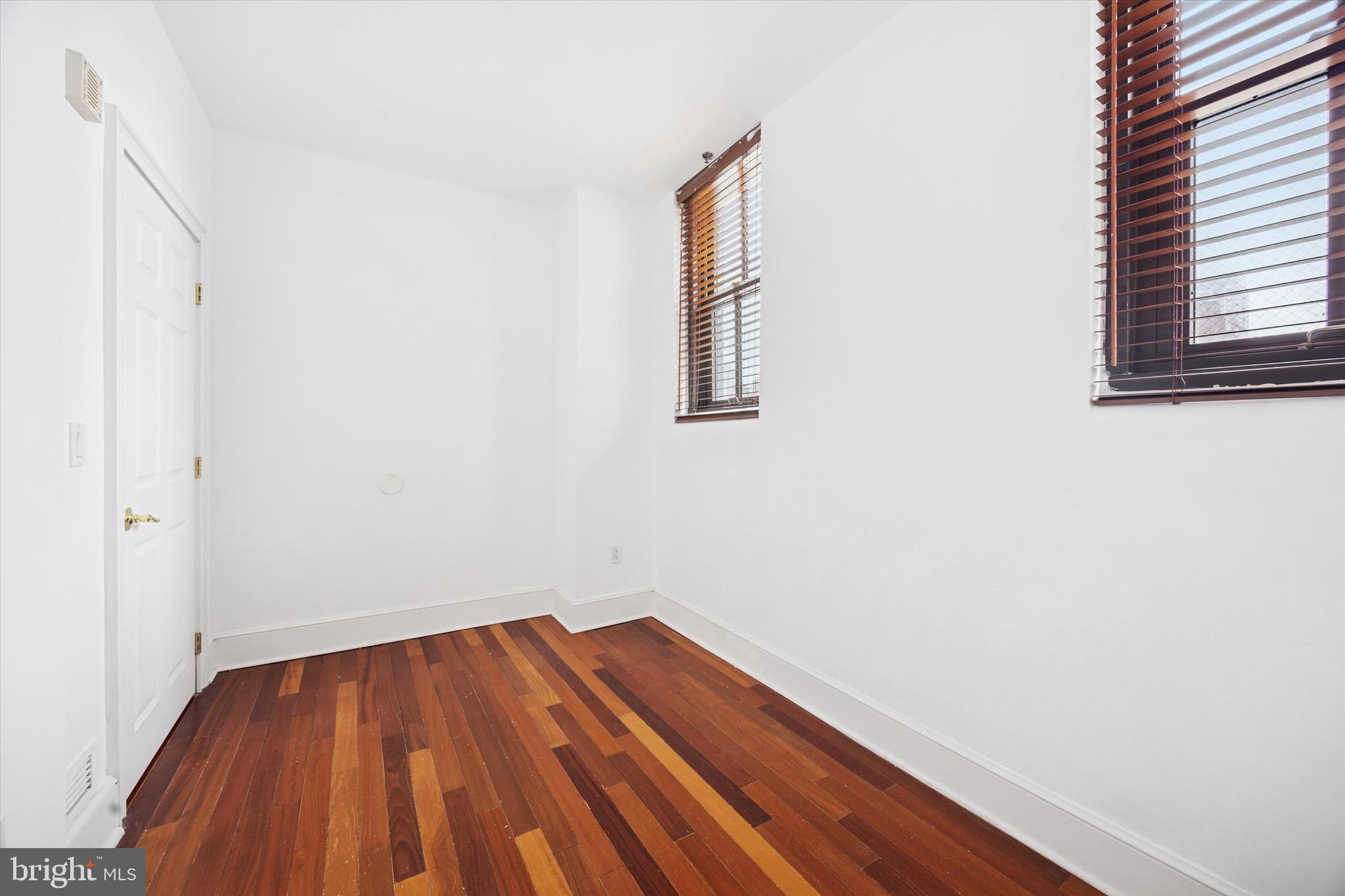 1500 Chestnut Street, Unit 15H Philadelphia, PA 19102 - Photo 20 of 25 a view of wooden floor in a room