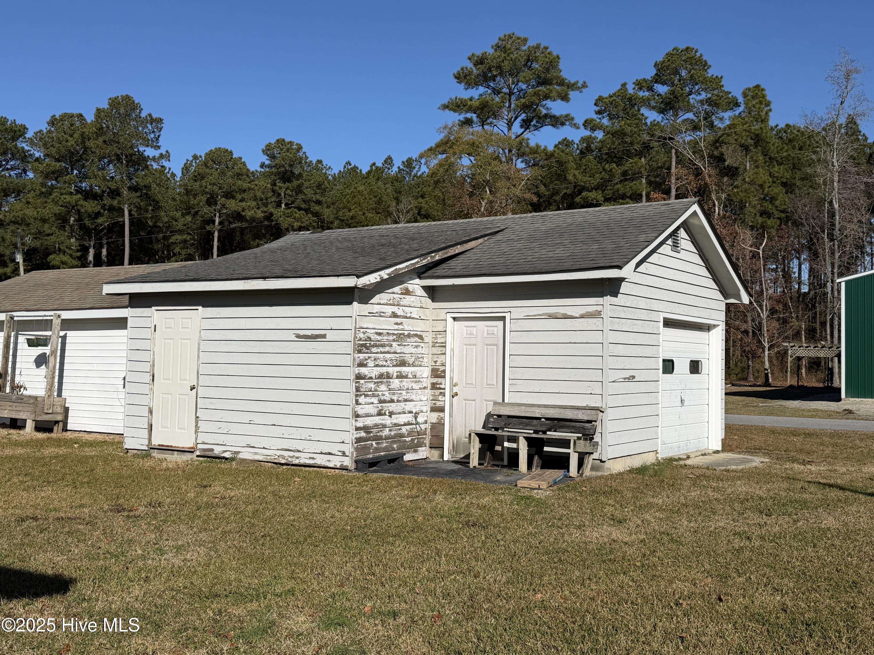 991 Pinecrest Road Bath, NC 27808 - Photo 43 of 57 Detached garage. Peeling paint is being sanded off and repainted.