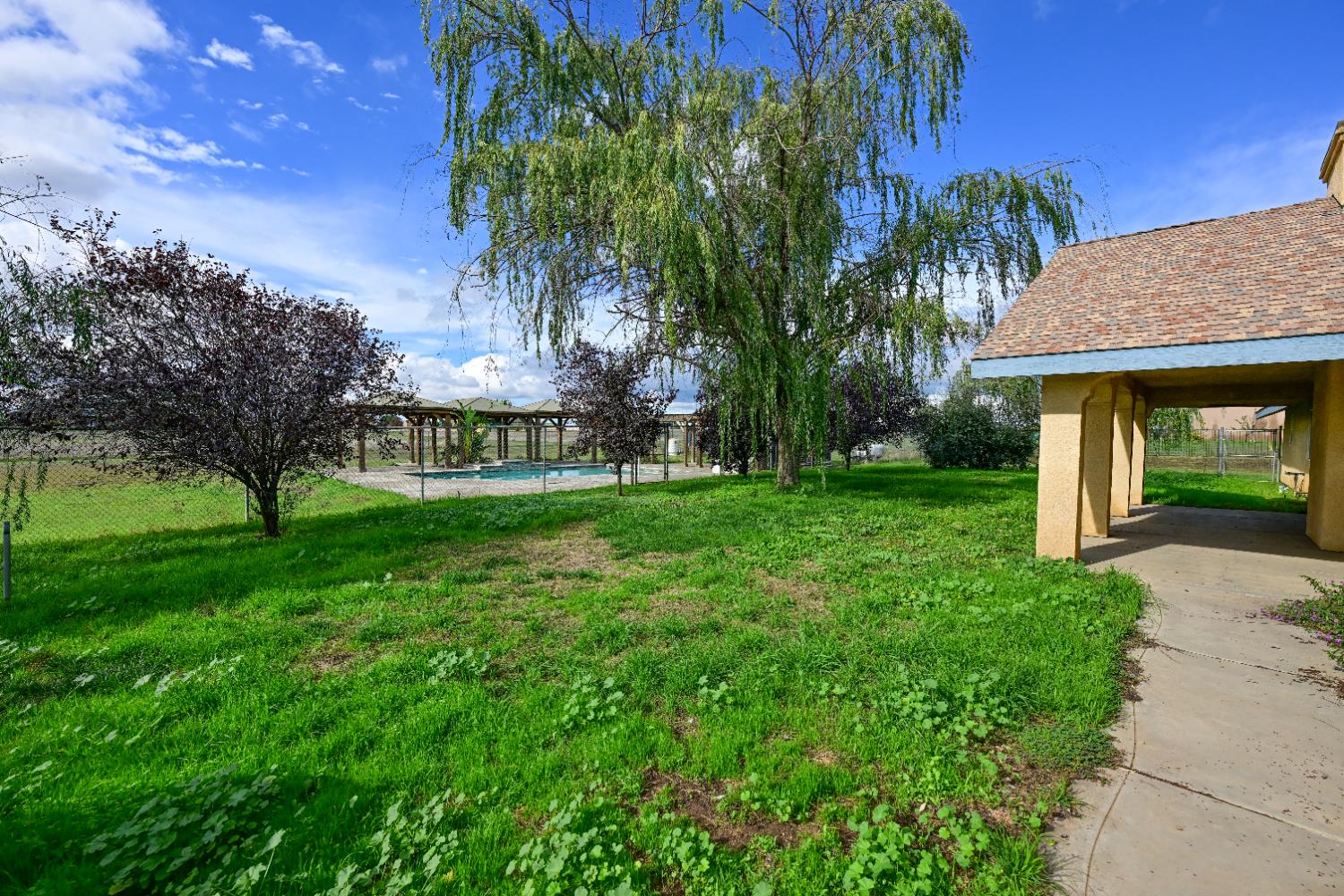 21088 Forest Glen Road Madera, CA 93638 - Photo 23 of 31 a view of a house with a yard