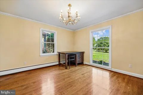 a kitchen with stainless steel appliances granite countertop a refrigerator a stove and a sink