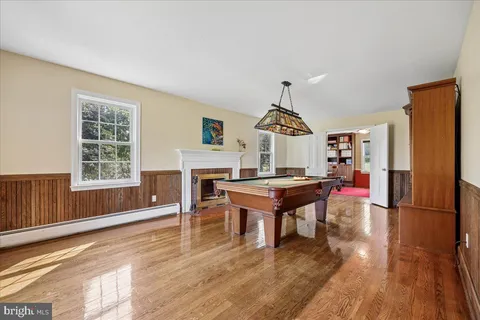 a room with furniture and a flat screen tv