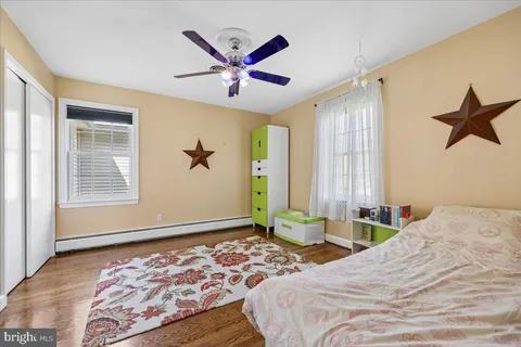 a picture of a bathroom with a shower