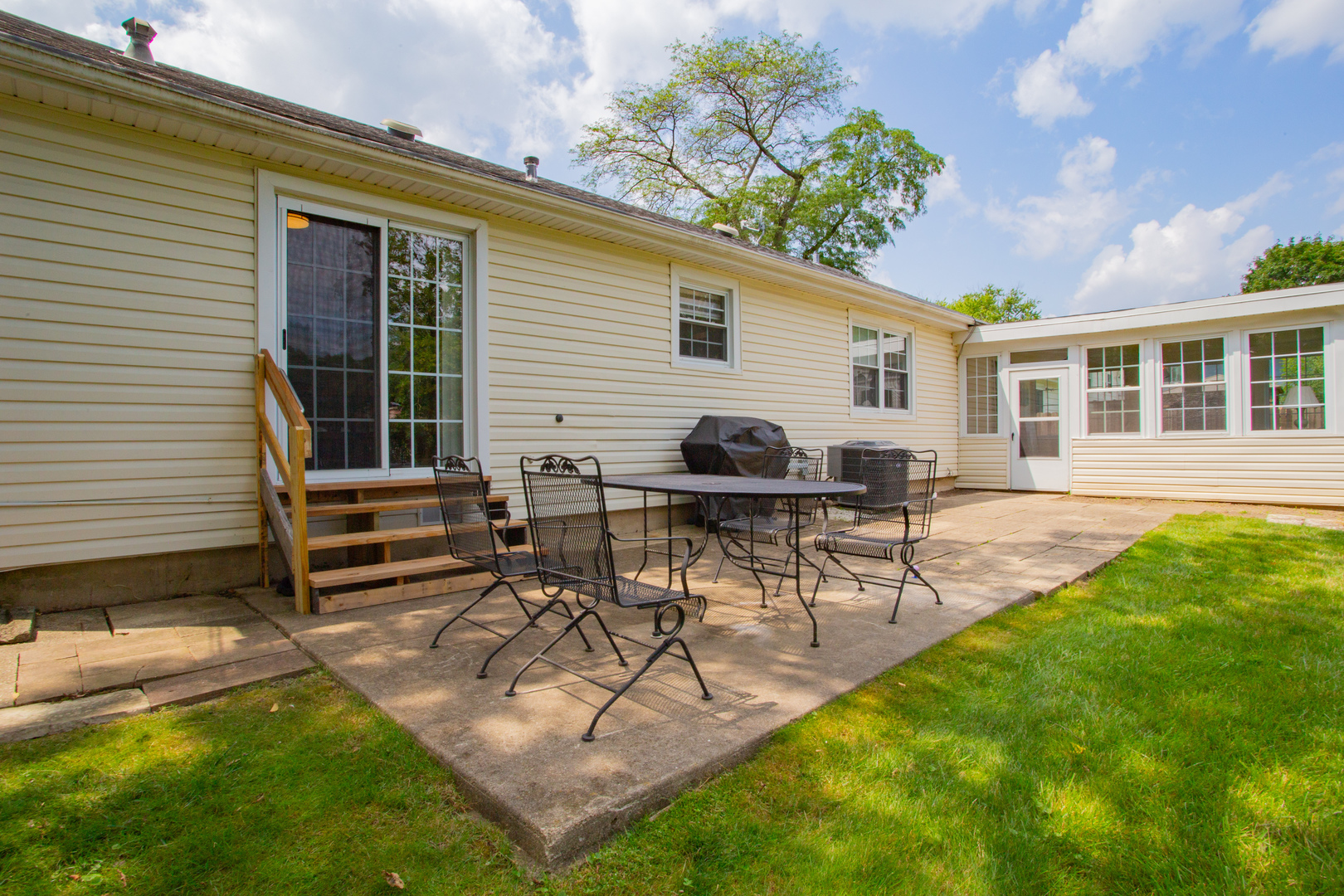 1749 North Happ Road Northbrook, IL 60062 - Photo 21 of 27 a view of a house with backyard and sitting area