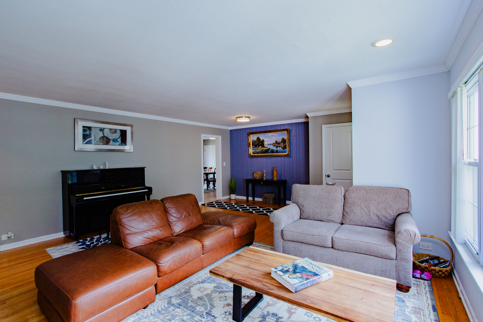 1749 North Happ Road Northbrook, IL 60062 - Photo 5 of 27 a living room with furniture and a couch