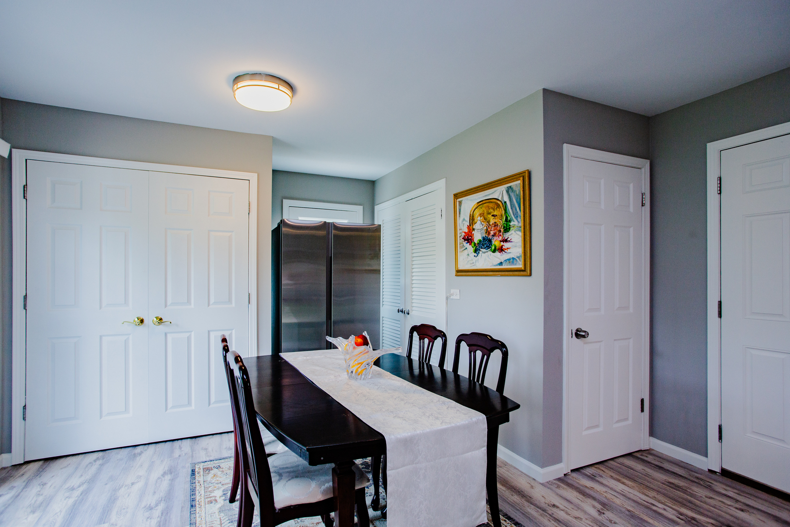 1749 North Happ Road Northbrook, IL 60062 - Photo 6 of 27 a view of a dining room with furniture and wooden floor