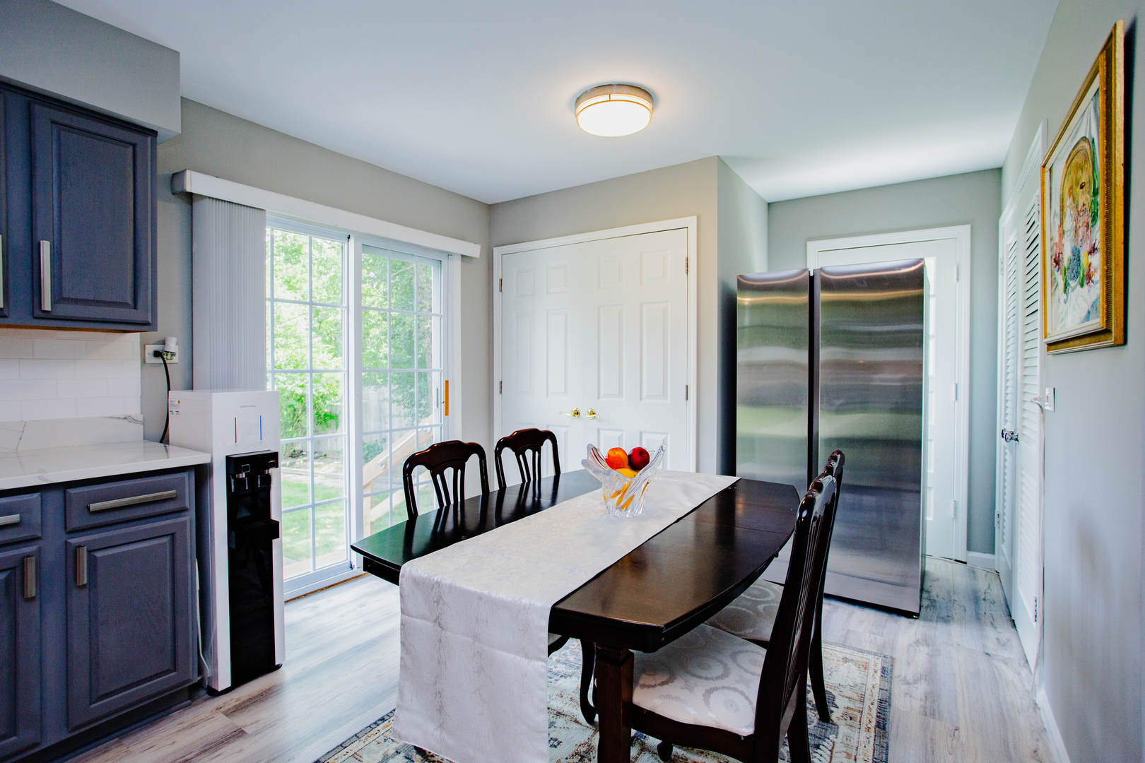 1749 North Happ Road Northbrook, IL 60062 - Photo 7 of 27 a view of a dining room with furniture window and wooden floor