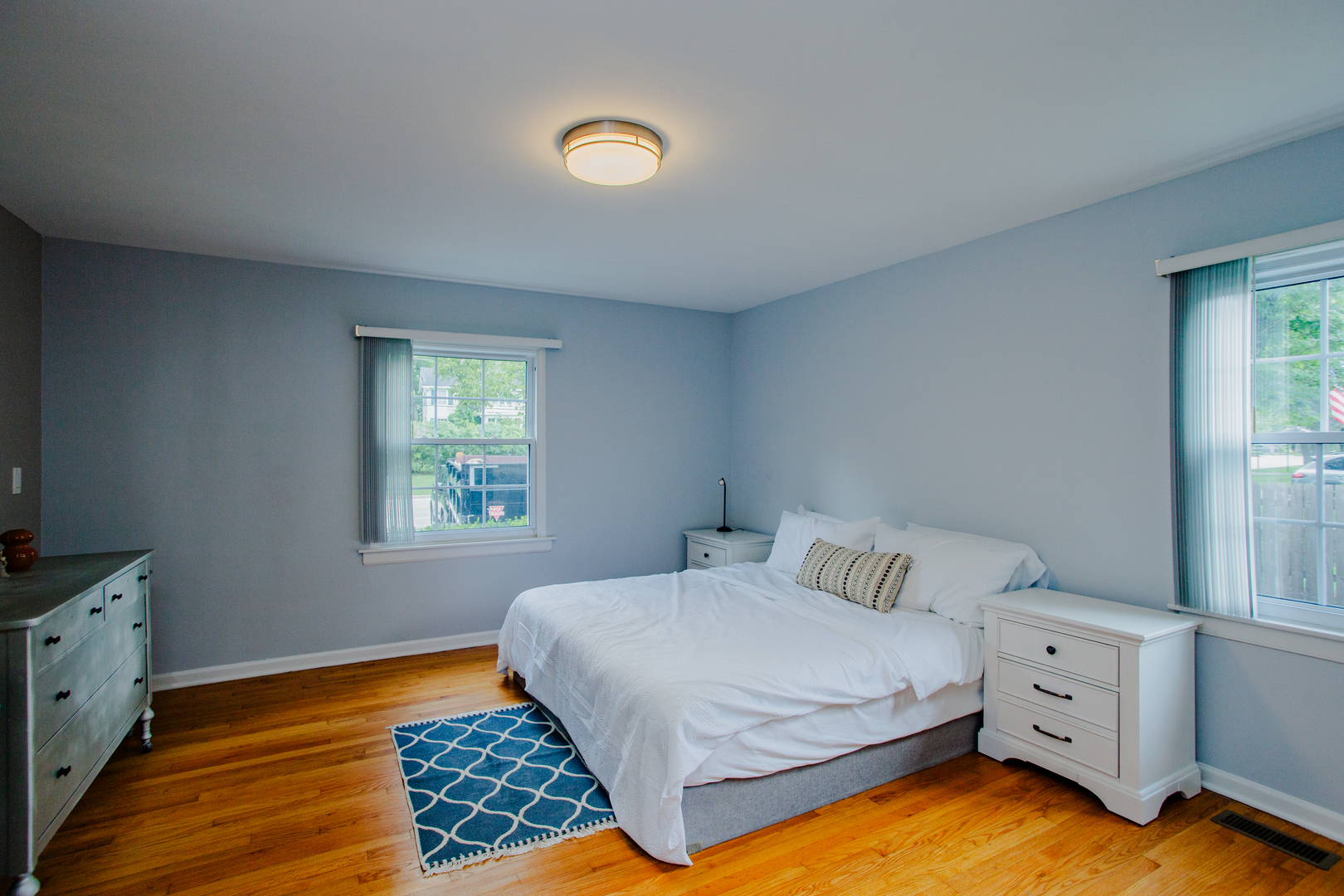 1749 North Happ Road Northbrook, IL 60062 - Photo 10 of 27 a bedroom with a bed and a window