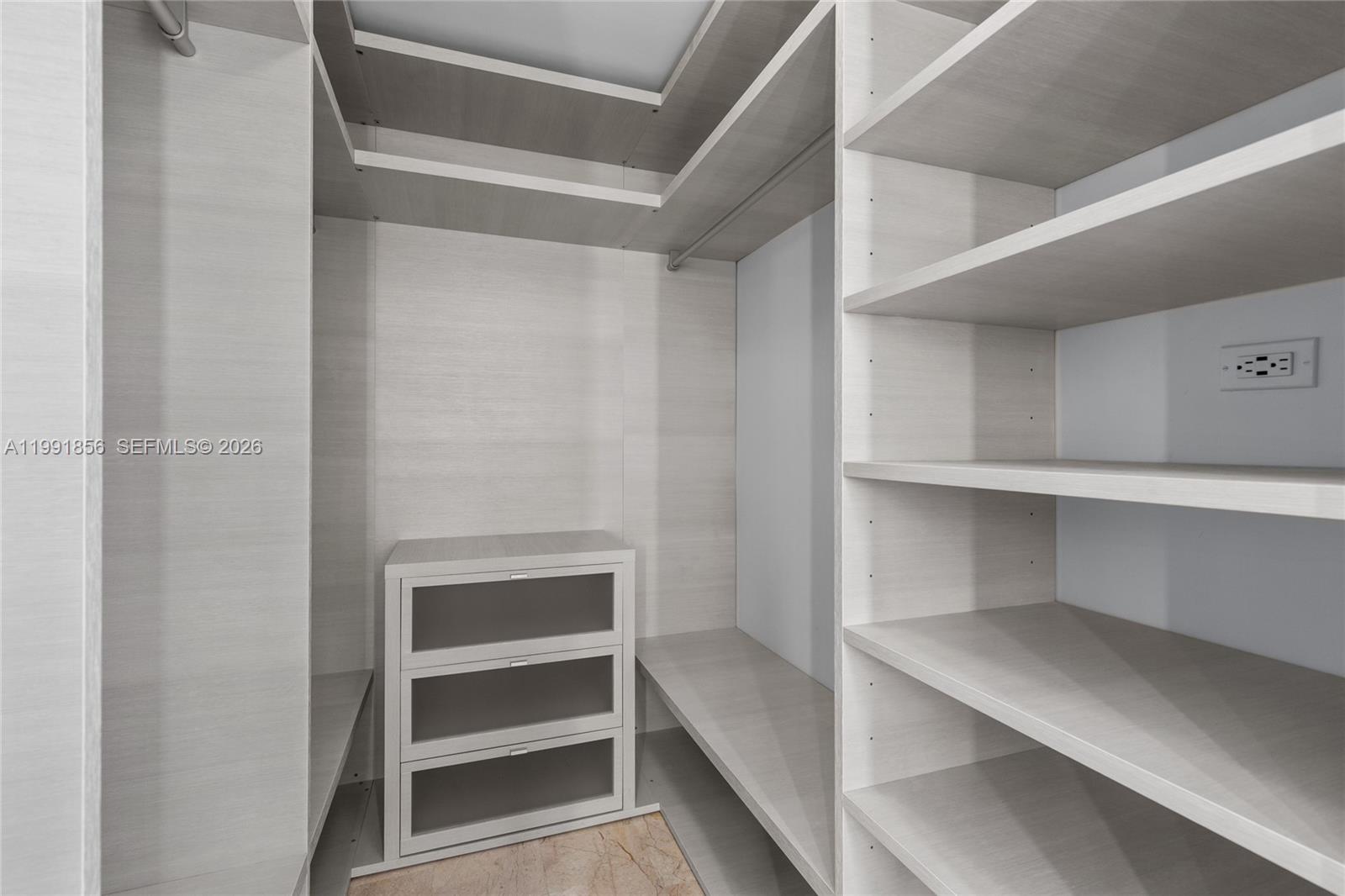 88 Southwest 7th Street, Unit 904 Miami, FL 33130 - Photo 26 of 34 a view of an empty walk in closet