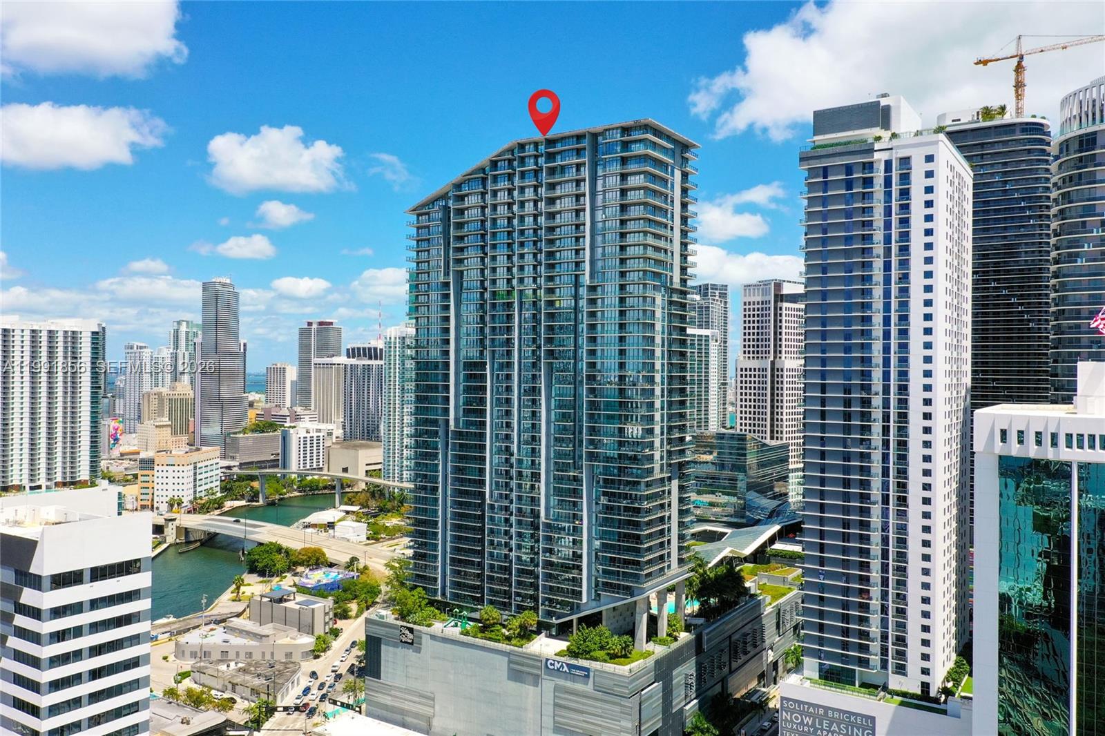 88 Southwest 7th Street, Unit 904 Miami, FL 33130 - Photo 32 of 34 a front view of a city with tall buildings