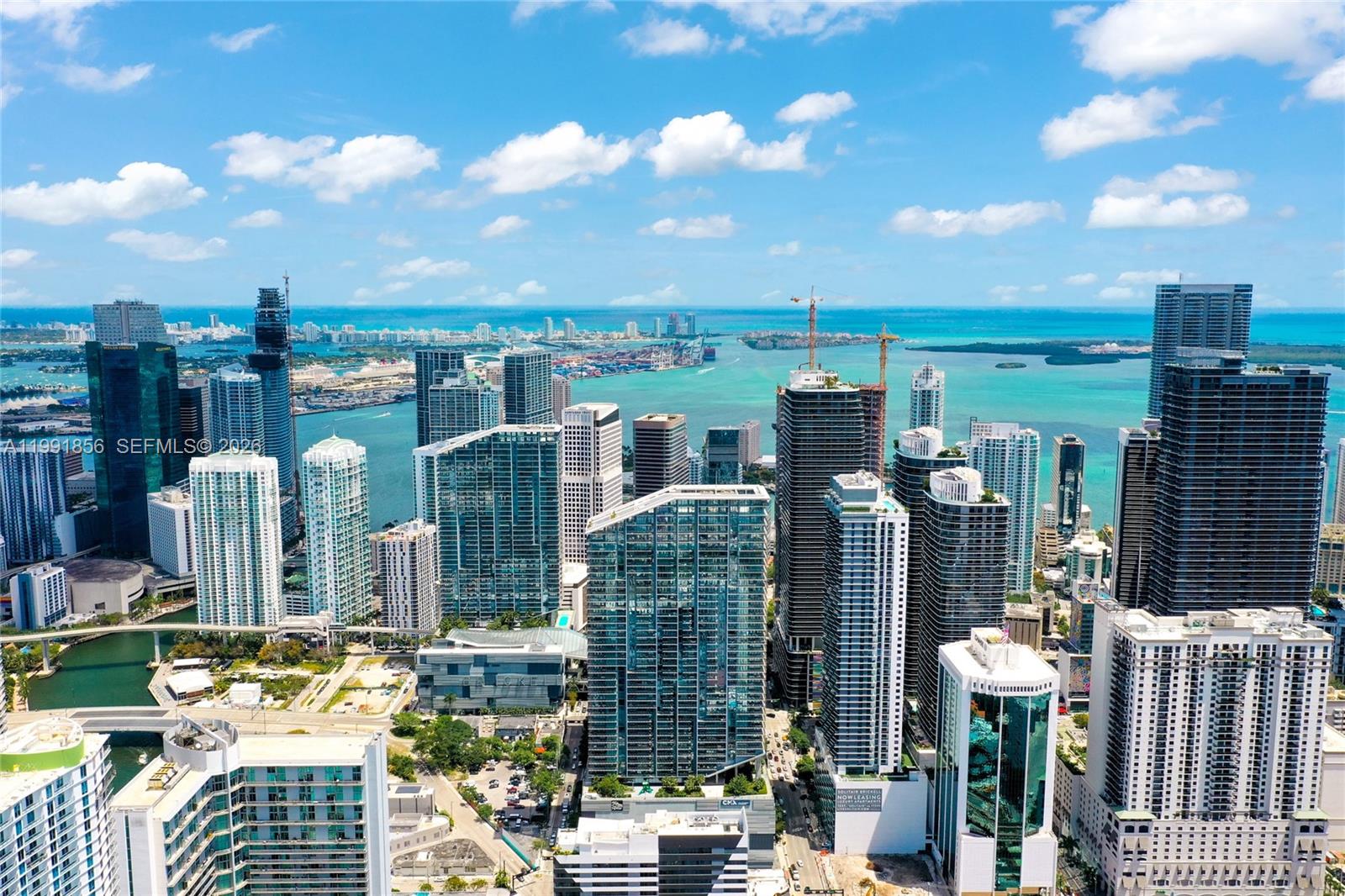 88 Southwest 7th Street, Unit 904 Miami, FL 33130 - Photo 34 of 34 a view of a city with tall buildings