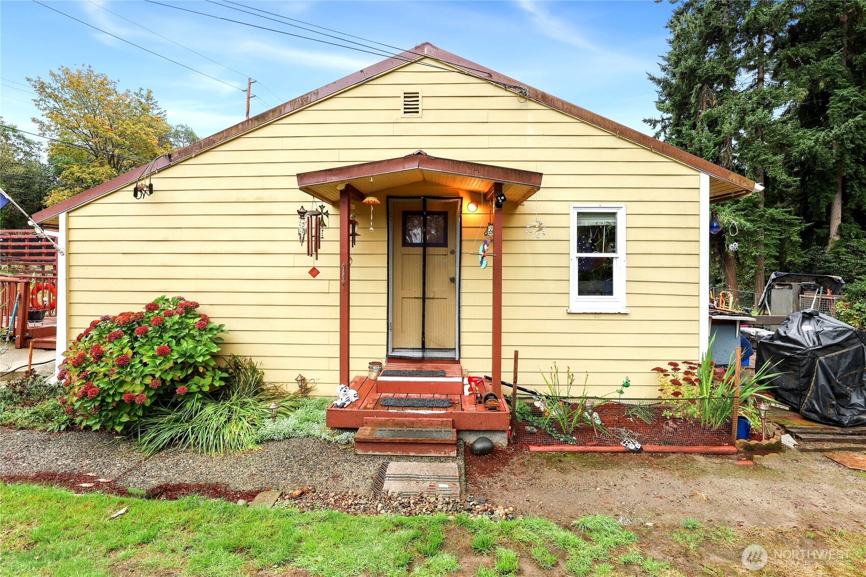 2853 Clare Avenue Bremerton, WA 98310 - Photo 1 of 21 a backyard of a house with seating space