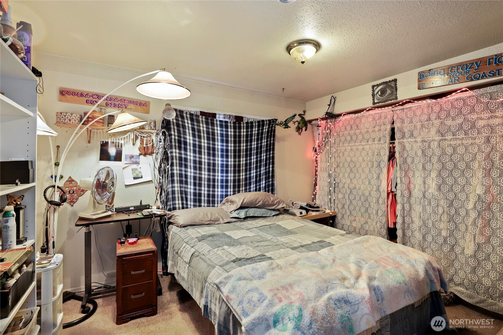 2853 Clare Avenue Bremerton, WA 98310 - Photo 13 of 21 a bedroom with a bed and a walk in closet