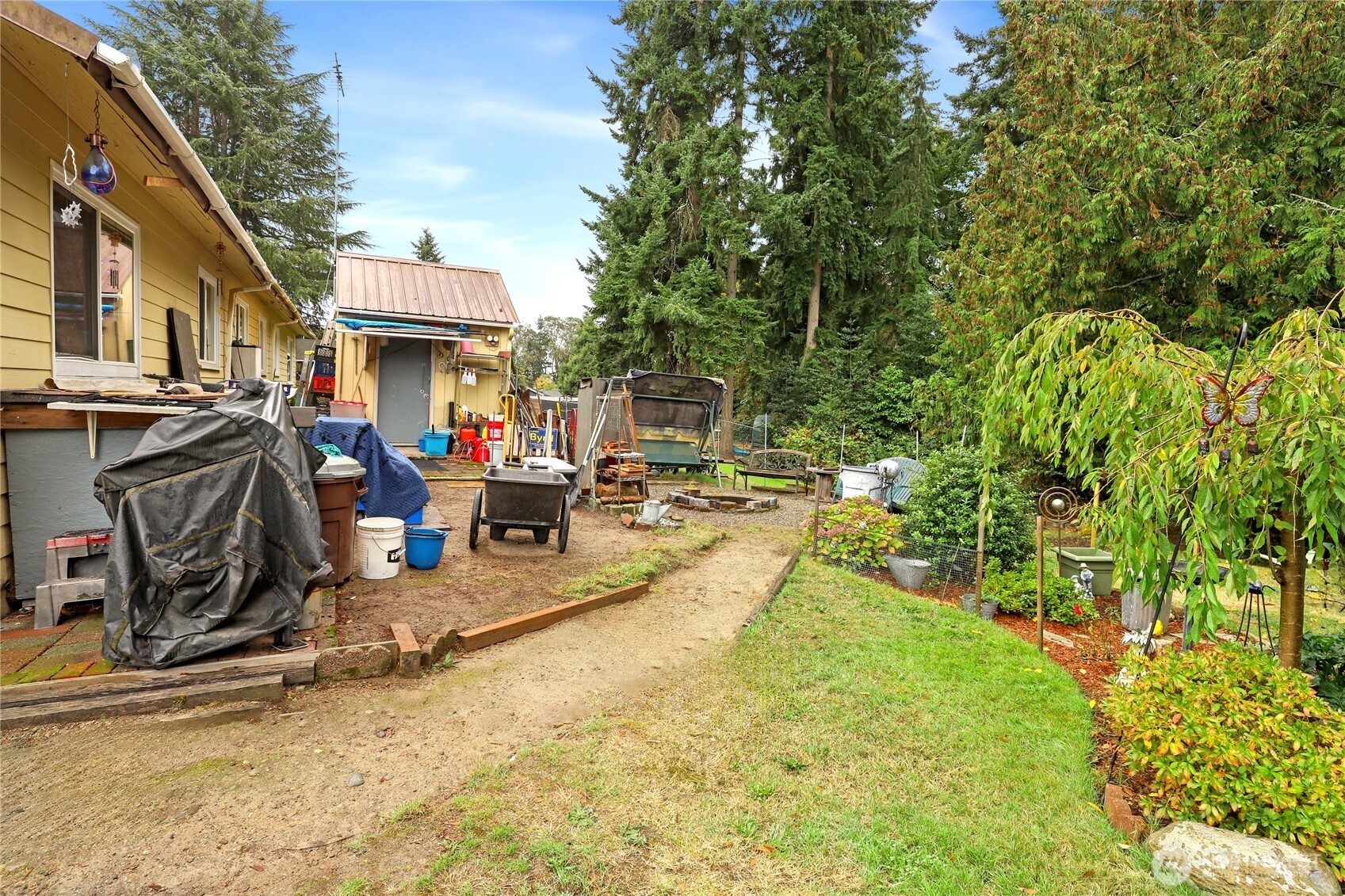 2853 Clare Avenue Bremerton, WA 98310 - Photo 16 of 21 a view of a yard with table and chairs