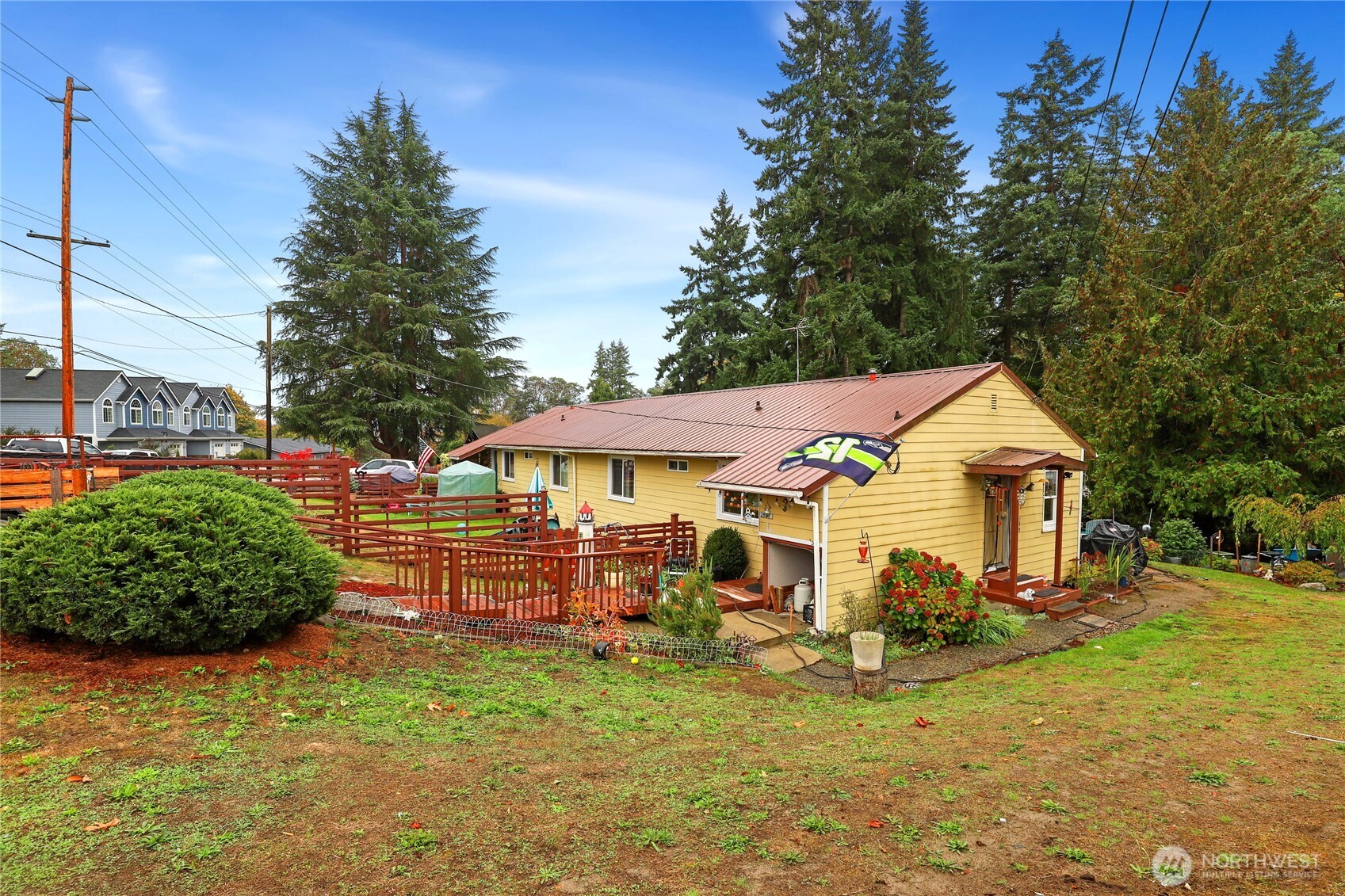 2853 Clare Avenue Bremerton, WA 98310 - Photo 20 of 21 a view of a house with a backyard and plants
