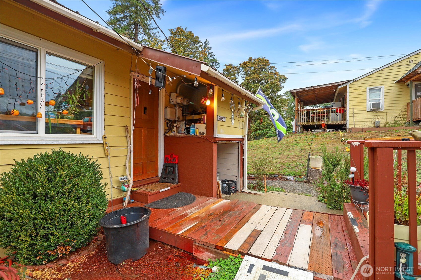 2853 Clare Avenue Bremerton, WA 98310 - Photo 2 of 21 a view of a house with a backyard