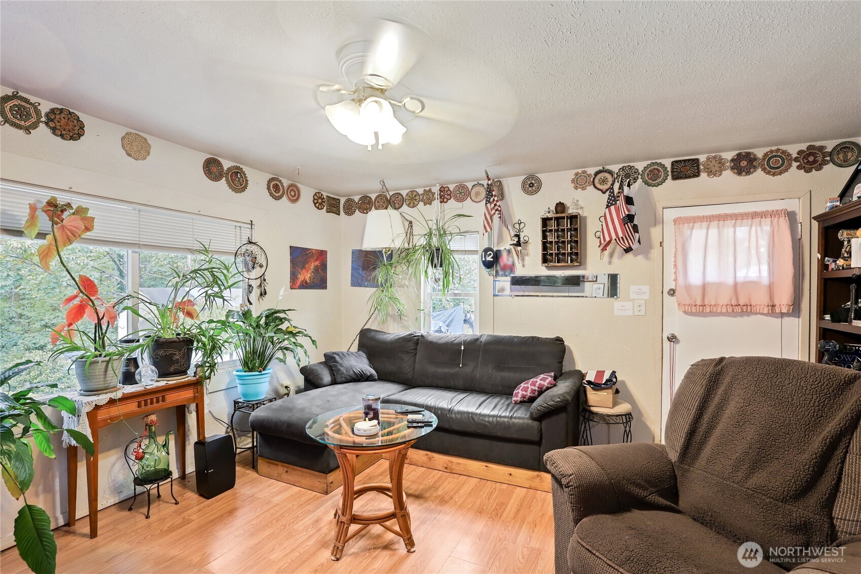 2853 Clare Avenue Bremerton, WA 98310 - Photo 4 of 21 a living room with furniture and a chandelier