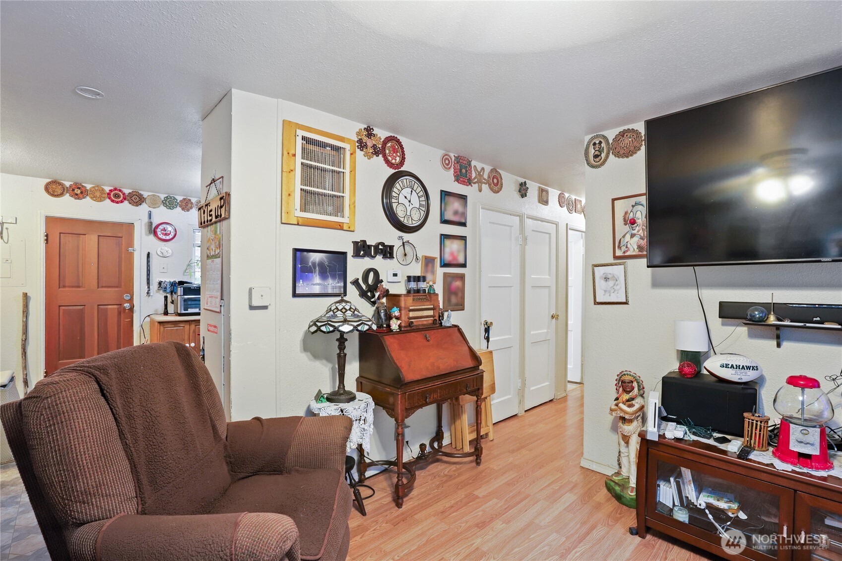 2853 Clare Avenue Bremerton, WA 98310 - Photo 6 of 21 a living room with furniture and a flat screen tv