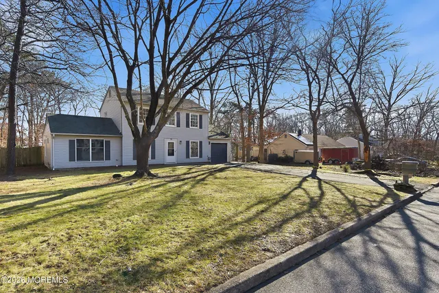 a house with trees in front of it