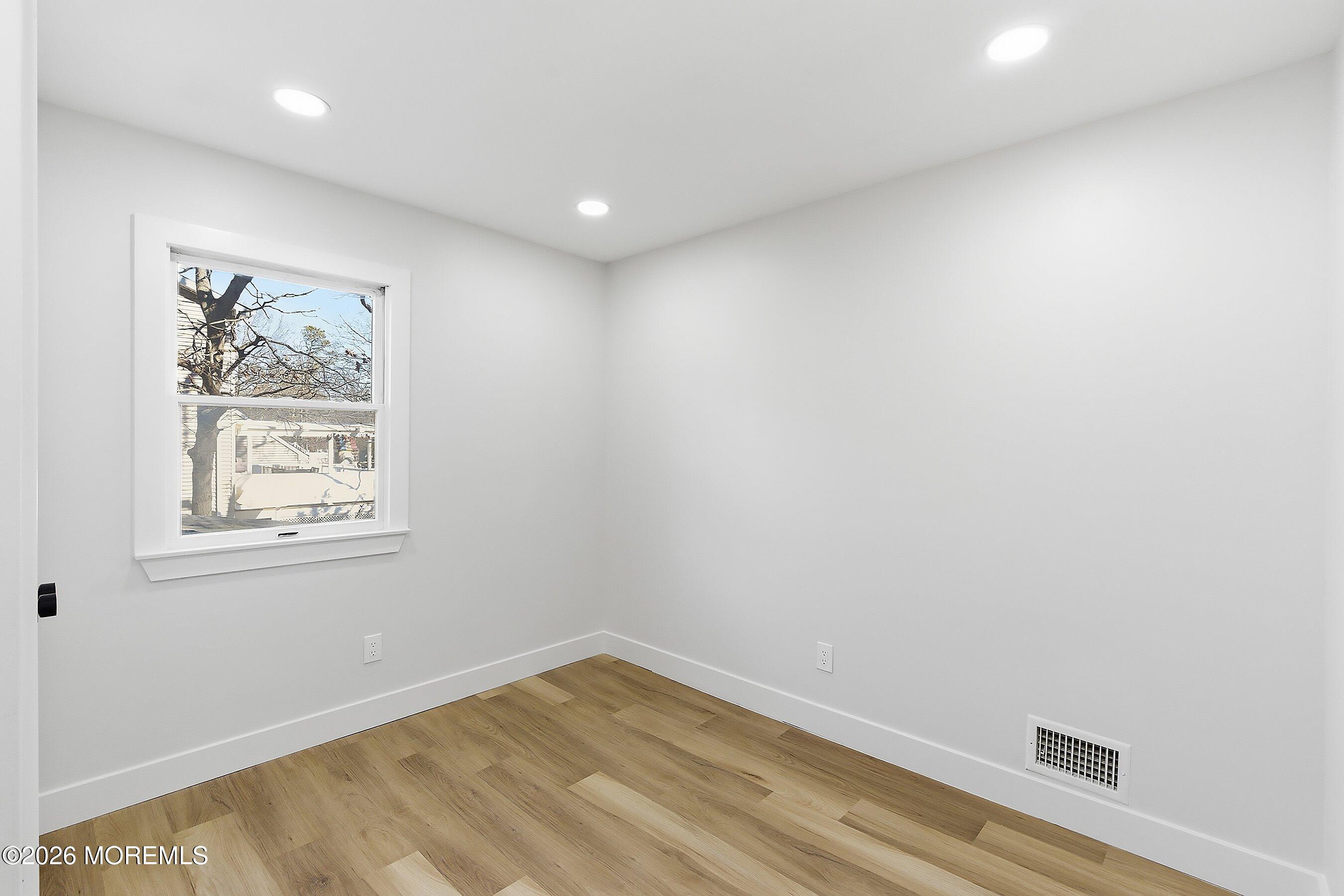16 6th Street Barnegat, NJ 08005 - Photo 26 of 36 an empty room with a window