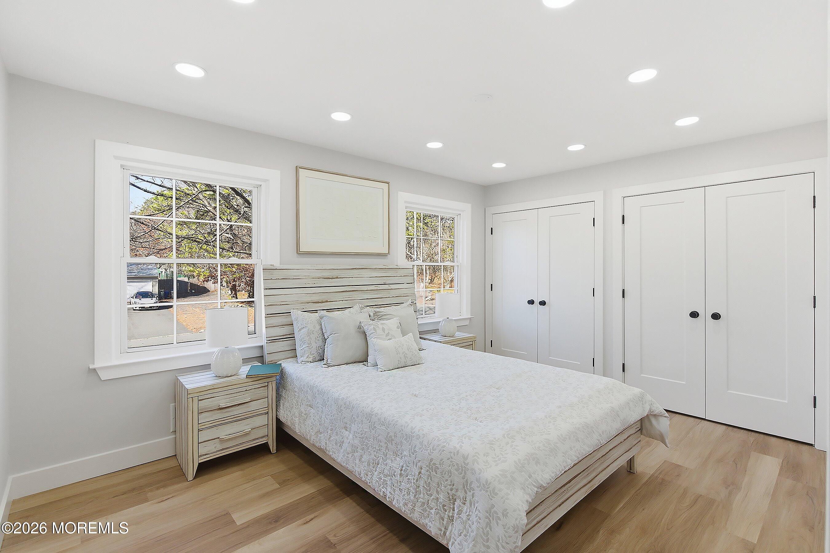 16 6th Street Barnegat, NJ 08005 - Photo 27 of 36 a spacious bedroom with a large bed and a window
