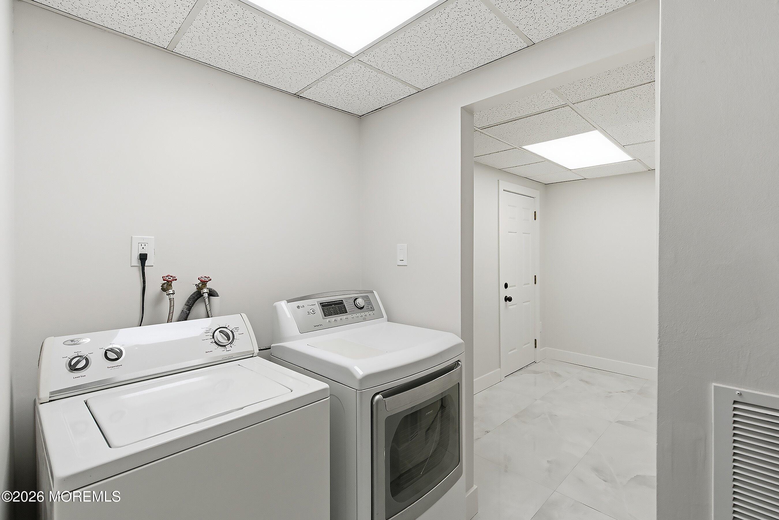 16 6th Street Barnegat, NJ 08005 - Photo 33 of 36 a utility room with dryer and washer