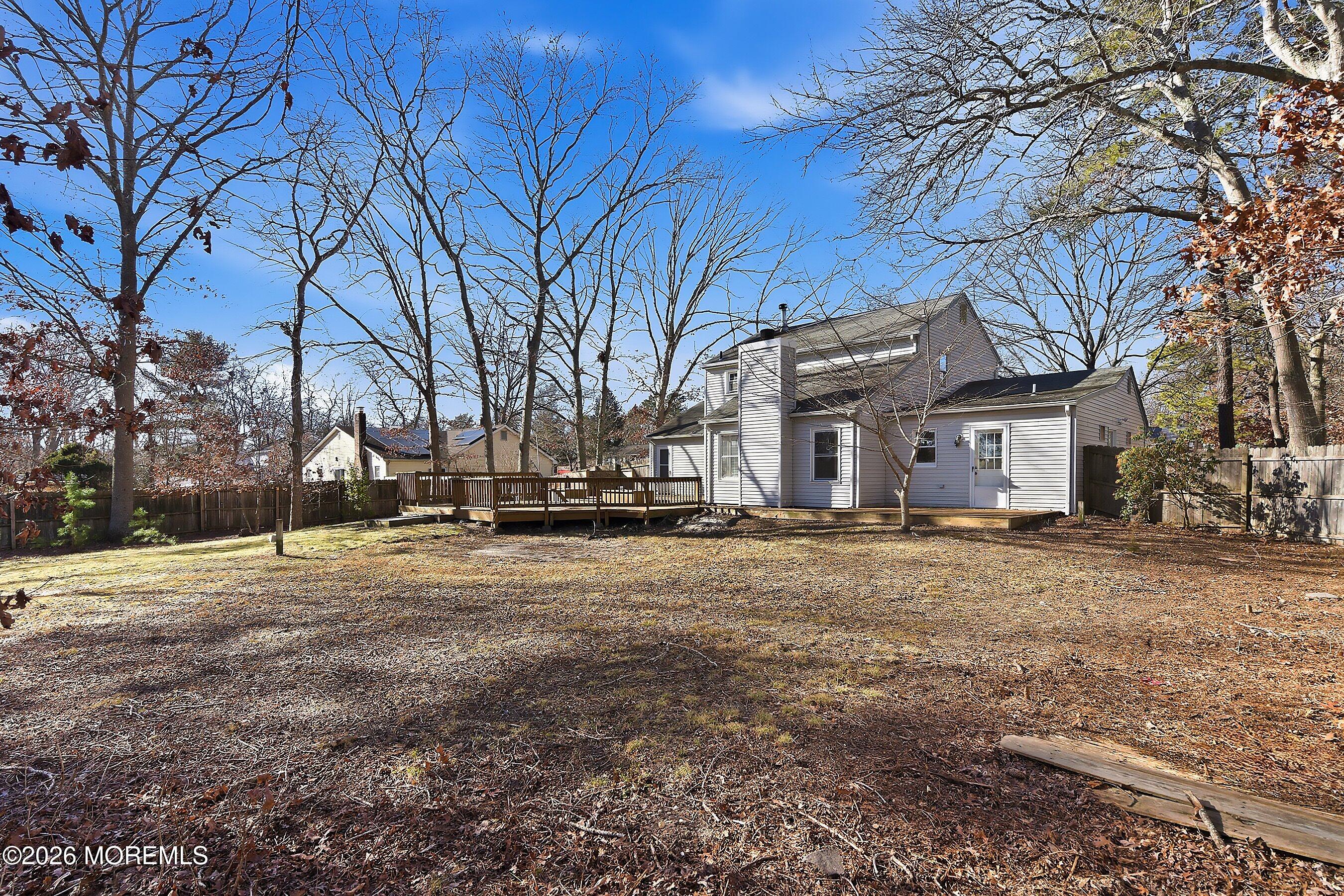 16 6th Street Barnegat, NJ 08005 - Photo 35 of 36 a view of a yard with a large tree