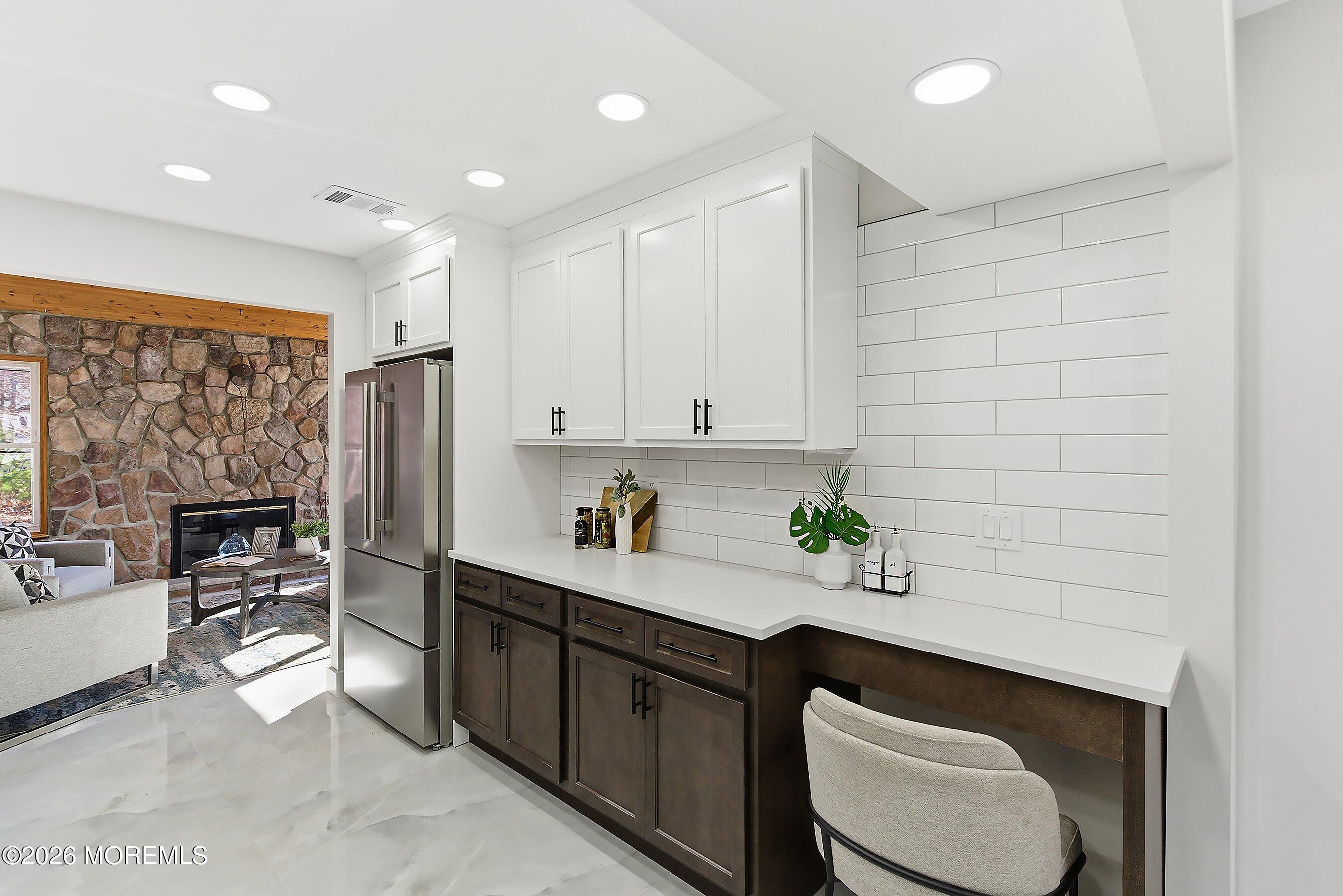 16 6th Street Barnegat, NJ 08005 - Photo 9 of 36 a kitchen with a sink cabinets and window