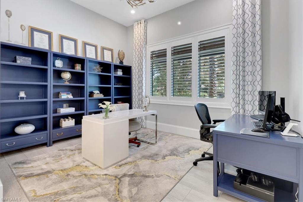1425 Crayton Road Naples, FL 34102 - Photo 4 of 31 Home office featuring light wood-type flooring