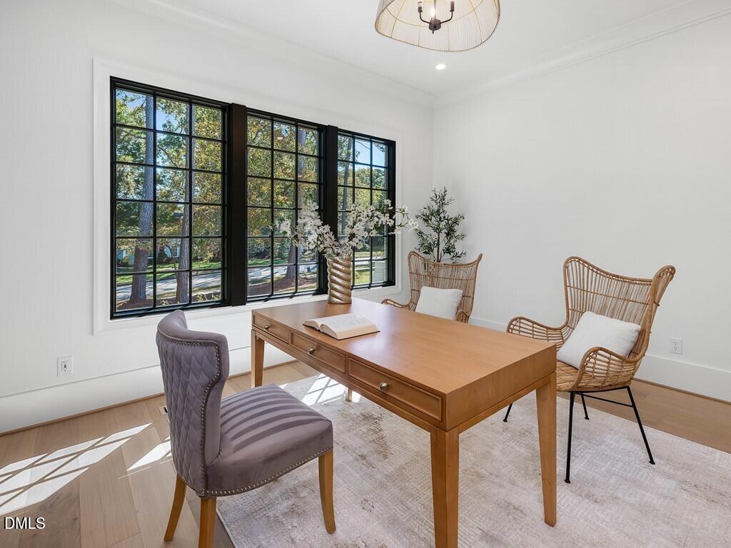 7013 Buckhead Drive Raleigh, NC 27615 - Photo 37 of 80 a view of a dining room with furniture window and outside view