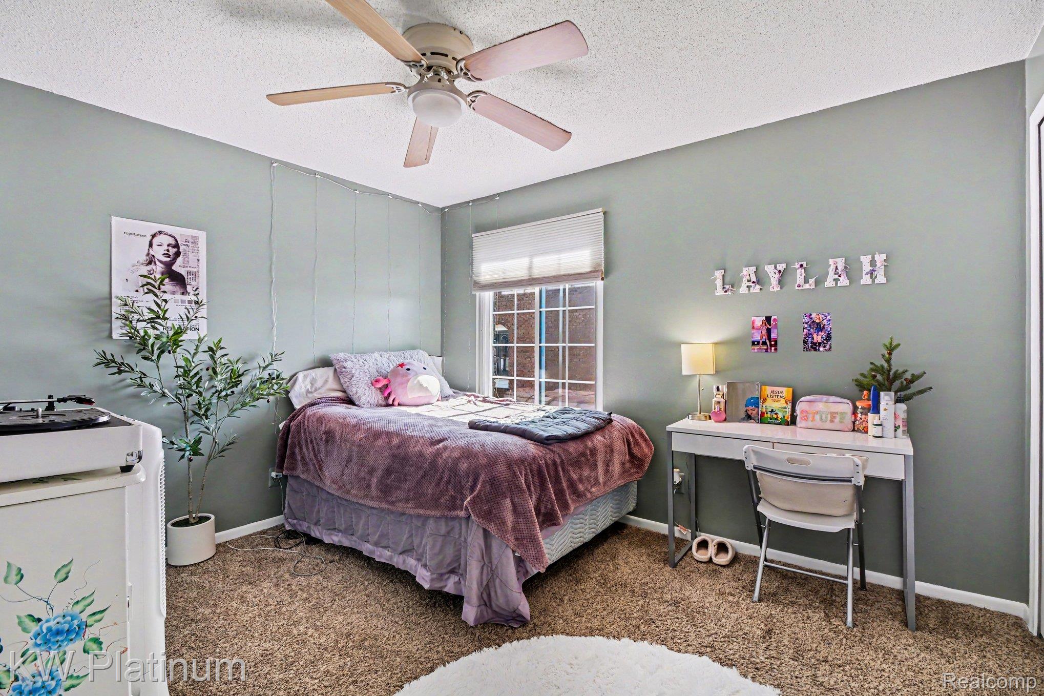 1900 River Road, Unit C5 Marysville, MI 48040 - Photo 11 of 15 Carpeted bedroom featuring a textured ceiling and a ceiling fan