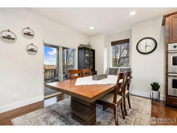 a open kitchen with a table and chairs in it
