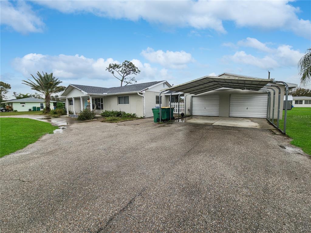 30193 Oak Road Punta Gorda, FL 33982 - Photo 1 of 1 a view of a house with a yard