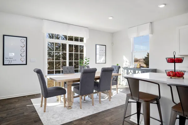 a kitchen with stainless steel appliances granite countertop a sink and a stove top oven