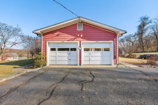 a front view of a house with a garage